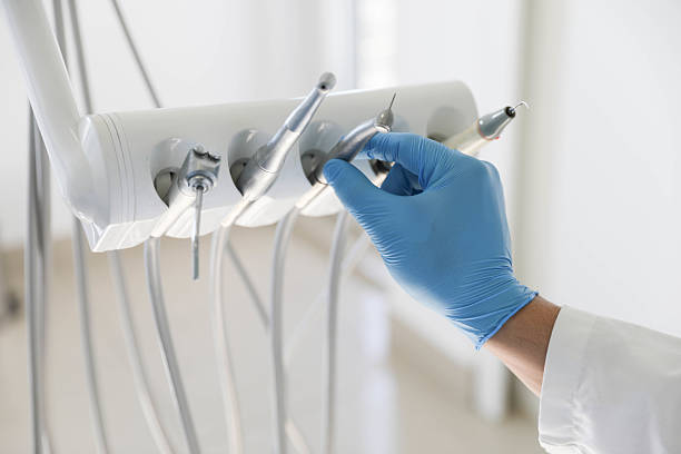 Professional Invisalign Clear Aligners technician working in Wells Branch, TX